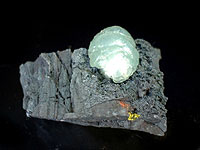 Brucite on Hausmannite, N‘Chwaning III shaft, Kuruman, South Africa, 2.4 x 3.1 x 4.3 cm; Gerdus Bronn photo