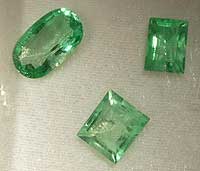 Microcline cut gems, Vietnam; largest gem 1.3 x 2 cm, weight 10 carats. Rob Lavinsky specimens; Jeff Starr photo